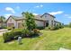 Beautiful single-story home boasting a tile roof, two-car garage, and manicured landscaping at 11125 Mcdermott Ct, Englewood, FL 34223