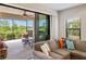 Relaxing view from the living room of the screened lanai and lush backyard at 11125 Mcdermott Ct, Englewood, FL 34223