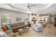 Open-concept living room flows seamlessly into the kitchen, perfect for entertaining guests at 11125 Mcdermott Ct, Englewood, FL 34223