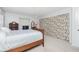 Bright bedroom featuring a ceiling fan, natural light, and a large closet with lovely patterned doors at 113 Annapolis Ln, Rotonda West, FL 33947