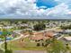 An aerial view showcases this home’s placement in a quiet neighborhood close to local amenities at 1155 Osceola Blvd, Englewood, FL 34223