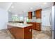 Well-equipped kitchen with granite countertops, stainless steel appliances, and custom cabinets at 1155 Osceola Blvd, Englewood, FL 34223
