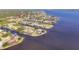 Waterfront community with a canal system, offering stunning homes and easy access to the open water at 12445 Krome Ave, Port Charlotte, FL 33981