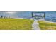 Waterfront property features a boat lift, providing convenient access to the open water at 12445 Krome Ave, Port Charlotte, FL 33981
