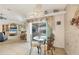Bright dining area with sliding glass doors to the lanai at 12445 Krome Ave, Port Charlotte, FL 33981