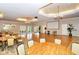 Elegant ballroom featuring wood floors, neutral decor, and ample space for gatherings at 1318 Ballota Ln, North Port, FL 34289