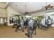 Spacious gym with modern equipment and mirrors at 1318 Ballota Ln, North Port, FL 34289