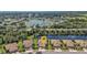 An aerial view of the homes, with water views and meticulously landscaped yards in the neighborhood at 1339 Backspin Dr, Englewood, FL 34223
