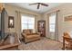 Cozy living room with wood furnishings, neutral decor, and ample natural light at 1339 Backspin Dr, Englewood, FL 34223