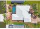 Aerial view of the property showcasing backyard pool, spa, and waterfront access at 15092 Chinook Way, Port Charlotte, FL 33981