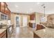 Well-equipped kitchen featuring granite countertops, stainless steel appliances, and ample cabinet space at 15092 Chinook Way, Port Charlotte, FL 33981