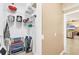Walk-in closet with wire shelves and storage of home necessities, located next to the kitchen at 15092 Chinook Way, Port Charlotte, FL 33981