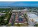 Stunning aerial image displays the community, nearby shopping centers and beautiful waterfront view at 1531 Placida Rd # 4-103, Englewood, FL 34223