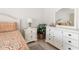 Bedroom showcasing stylish decor, a coordinated furniture set, and neutral colored walls at 1531 Placida Rd # 4-103, Englewood, FL 34223