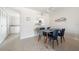 Dining room with ceiling fan and a view of kitchen at 1531 Placida Rd # 4-103, Englewood, FL 34223