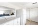 View of kitchen with white refrigerator and access to living room at 1531 Placida Rd # 4-103, Englewood, FL 34223