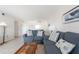 Cozy living room with tile floors, comfortable sofas, and bright lighting at 1531 Placida Rd # 4-103, Englewood, FL 34223