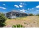 Expansive screened-in pool area with ample seating, perfect for outdoor entertaining and relaxation at 162 Fairway Rd, Rotonda West, FL 33947