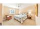 Cozy bedroom with neutral carpet and furnishings at 16716 Grande Quay Dr, Boca Grande, FL 33921