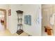 Bathroom area includes decorative shelving unit, towels, and a shower at 169 Fairway Rd, Rotonda West, FL 33947