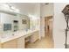 Bathroom area features double sinks, vanity area, and decor at 169 Fairway Rd, Rotonda West, FL 33947