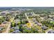 Community aerial view showcasing tree coverage and neighborhood layout at 1962 Remus Ave, North Port, FL 34286