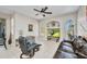 Open living space featuring tile floors and lots of natural light from windows at 1962 Remus Ave, North Port, FL 34286