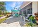 Relaxing outdoor patio with comfortable seating and a screened lanai, perfect for enjoying the weather at 1962 Remus Ave, North Port, FL 34286