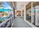 Enclosed patio with a dining table, seating area, and outdoor kitchen at 1962 Remus Ave, North Port, FL 34286