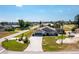 Beautiful home with screened-in pool and spacious driveway, ideally situated in a serene neighborhood at 204 Bunker Rd, Rotonda West, FL 33947