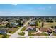 Expansive aerial view showcasing the property's prime location within a desirable residential community at 204 Bunker Rd, Rotonda West, FL 33947