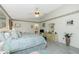 Large main bedroom with hardwood floors and an ensuite bathroom at 204 Bunker Rd, Rotonda West, FL 33947