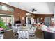 Spacious enclosed patio shows comfortable seating and tv area at 204 Bunker Rd, Rotonda West, FL 33947