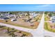 Aerial view of a single Gathering home with a large lot, highlighted with a red circle at 2075 Georgia Ave, Englewood, FL 34224