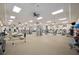 Spacious gym with modern exercise equipment and ample natural light at 23590 Copperleaf Dr, Venice, FL 34293