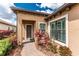 Front entrance with stone walkway and lush landscaping at 257 Corelli Dr, Nokomis, FL 34275