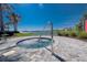 Relaxing hot tub with lake views, palm trees, and paver surround at 257 Corelli Dr, Nokomis, FL 34275