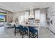 Bright eat-in kitchen features a large island, pendant lighting, and easy access to the lanai at 257 Corelli Dr, Nokomis, FL 34275