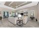 Bright living room showcasing custom built-ins and an open design for a spacious feel at 257 Corelli Dr, Nokomis, FL 34275