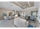 Spacious living area showcasing an open layout to the kitchen and dining area, great for gatherings at 257 Corelli Dr, Nokomis, FL 34275