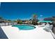 Gorgeous pool with sun loungers, table and chairs in fenced yard is perfect for relaxing at 2673 Titania Rd, Englewood, FL 34224