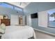 Main bedroom featuring ensuite bathroom access, closet, and a great view of the ocean at 2950 N Beach Rd # B324, Englewood, FL 34223