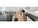 Updated kitchen with stainless steel appliances, sleek countertops, and ample cabinet space at 2957 Montgomery Dr, Port Charlotte, FL 33981