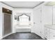 Bright bathroom featuring a soaking tub, glass shower, vanity, and tiled floor at 311 Boundary Blvd, Rotonda West, FL 33947