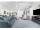 Bright, spacious living room with a view of the dining room and front entrance of the home at 311 Boundary Blvd, Rotonda West, FL 33947