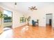 Bright entryway featuring wood-look flooring, a decorative window, and plenty of natural light at 3593 Birmingham Ln, North Port, FL 34288