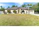 Charming single-story home featuring well-maintained landscaping and an attached two-car garage at 3593 Birmingham Ln, North Port, FL 34288