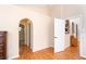 Hallway showcasing beautiful archways, lighting, and neutral colored walls at 3593 Birmingham Ln, North Port, FL 34288