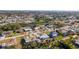 An aerial view of a beautiful residential neighborhood with canals and well-maintained landscaping at 360 E Wentworth Cir, Englewood, FL 34223