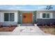 Beautiful front entrance featuring a double-door entry and decorative potted plants at 360 E Wentworth Cir, Englewood, FL 34223